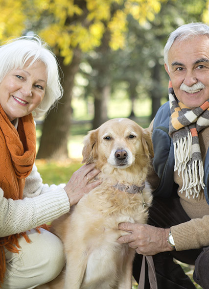 Older couple with dog